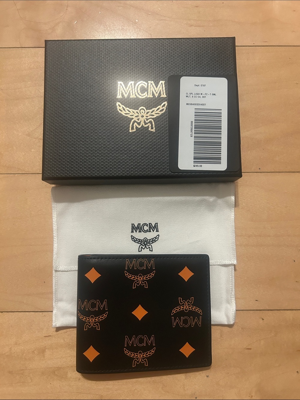 MCM Black Leather Bifold Wallet with Orange Monogram Motif